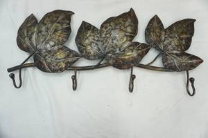 lot 144 image: Metal Wall Decor. 3 Maple Leaves and Coat Hooks