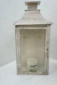 lot 153 image: Home Roots Distressed Beige Glass and Metal Floor Lantern Candle Holder.