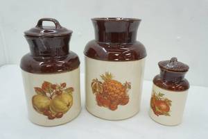 lot 73 image: Vintage McCoy Pottery Fruit Festival Milk Can Style, two-toned Glazed Ceramic Canister Set. 1970s