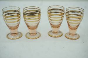 lot 230 image: Vintage Romanian Pink Depression and Gold Bohemian Shot Glasses (4ct)