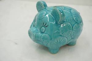 lot 406 image: Glazed Ceramic Turquoise Blue Piggy Bank with a Floral Design (no stopper)