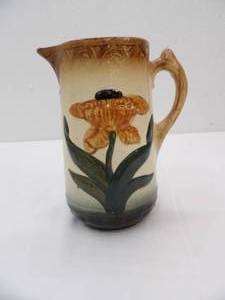 lot 592 image: Vintage Majolica Art Pottery Pitcher with a Raised Tulip Design. Earthenware