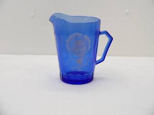 lot 621 image: Vintage Cobalt Blue Shirley Temple Pitcher 4.5 tall