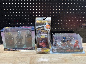 lot 1 image: Marvel Shang-Chi Figurine Set, Monsterpocalypse Collectible Miniature Game and Redakai Starter Pack