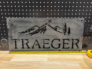 lot 36 image: Traeger Metal Sign
