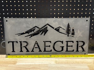 lot 38 image: Metal Traeger Sign