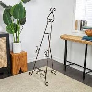 lot 24 image: Lot of Litton Lane 55 in. Bronze Metal Tall Adjustable Display Stand 2 Tier Scroll Easel with Chain Support Customer Returns See Pictures