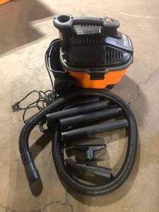 lot 13 image: RIDGID 4 Gal. 5.0 Peak HP Portable Shop Vacuum Wet Dry Vac with Fine Dust Filter, Locking Hose and Attachments WD4070 Customer Returns See Pictures