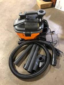 lot 20 image: RIDGID 4 Gal. 5.0 Peak HP Portable Shop Vacuum Wet Dry Vac with Fine Dust Filter, Locking Hose and Attachments WD4070   Customer Returns See Pictures