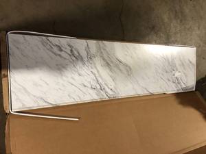 lot 48 image: Hampton Bay 8 ft Straight Laminate Countertop Kit Included in Gloss Calcutta Marble   Customer Returns See Pictures