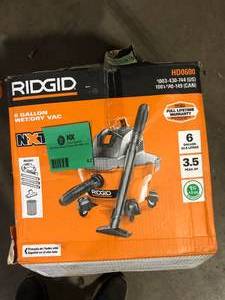 lot 62 image: RIDGID 6 Gal. 3.5 Peak HP NXT Shop Vacuum Wet Dry Vac with General Debris Filter, Locking Hose and Attachments HD0600   Customer Returns See Pictures