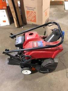 lot 29 image: Toro Power Clear 180 87cc 4-CycleOHV 18 inch Width Snow Blower For Parts  Customer Returns See Pictures