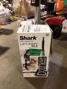 lot 41 image: Shark Navigator Lift-Away DLX Bagless, Cordless, Upright Vacuum Cleaner with Detachable Canister and HEPA Filter for Pet Hair  Used Good  Customer Returns See Pictures