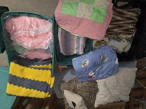 lot 19 image: 3 bins quilts throw pillows