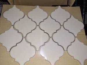 lot 38 image: Antique white arabesque mosaic tile