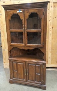lot 13 image: Solid wood and glass corner cabinet