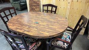 lot 233 image: Vintage wood table with metal legs and casters, and 4 solid wood chairs