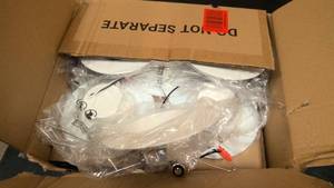 lot 51 image: Box of 12 retrofit 56 LED Baffle and bulb insert