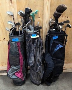 lot 74 image: three right handed sets of golf clubs
