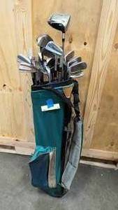 lot 75 image: Catch all bag of misc golf clubs - irons and R5 driver