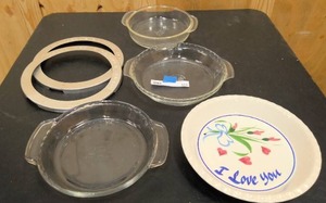 lot 113 image: 4 pie pans and 2 pie crust shields
