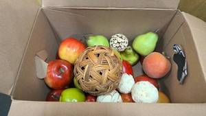 lot 155 image: Box of decorative fruit, woven balls, and other dcor