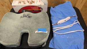 lot 157 image: Bod Support Pillow, and two heating pads