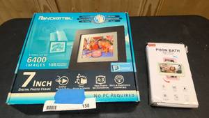 lot 158 image: 7 In digiatal Photo Frame and Phon Bath phone case