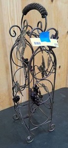 lot 171 image: Decorative metal wine holder