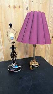lot 186 image: Mismatched table lamps  one black and modern, and the other vintage brass