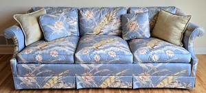 lot 16K image: LR - Upholstered Sofa with Blue Bird and Floral Pattern and Pillows