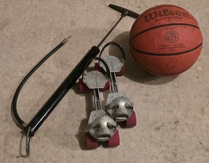 lot 57K image: LL-G - Basketball, Pump, and Set of Vintage Adjustable Roller Skates