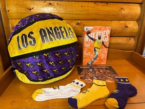 lot 15 image: La Lakers Collectibles - Vintage Laker Girls Photo, LeBron James Wheaties box, Large Ball and Three Pair New Socks