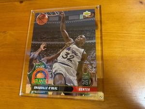 lot 34 image: Shaquille ONeal Upper Deck 9293 All Division Team AD Blow Up Card in Lucite Holder.