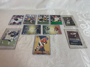 lot 97 image: Oversized Football Cards (10) in Protective Covers