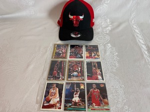 lot 99 image: New Chicago Bulls Hat with Nine Trading Cards Including Two Scottie Pippen Cards