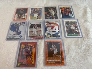 lot 214 image: Ten NBA Player Cards Reggie Miller, Charles Barkley, Isiah Thomas, Carmelo Anthony, Derrick Rose, Chris Weber, Jalen Rose, Tyrese Maxey and Seth Curry