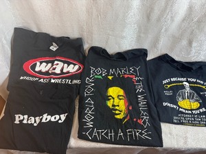 lot 219 image: Bob Marley (XL), Whoop Ass Wrestling (XL), Playboy (L), Bullet Proof Newark, NJ (L) Gently Used T-Shirts