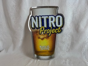 lot 224 image: Samuel Adams Nitro Project Tin BeerMancave Sign 12 x 17.5