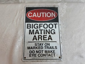 lot 243 image: Mancave Tin Sign Big Foot Mating Area 8 x 12 Tall