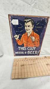 lot 216 image: 16x12 This Guy Needs a Beer Metal Sign