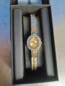 lot 18 image: Womens Goldtone Crystal Watch with Bracelet Band