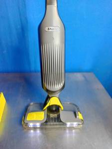 lot 29 image: Shark VACMOP Pro Cordless Hard Floor Vacuum Mop.