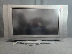 lot 1 image: Olevia 232-S13 32-Inch LCD TV with Stand and Multiple Inputs