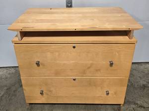 lot 16 image: Wooden Two Drawer Filing Cabinet with Raised Top Shelf, 38 in Wide - no key