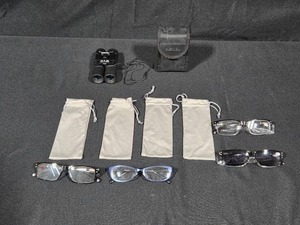 lot 27 image: Bushnell 10x25 Binoculars with Case and Set of 4 Reading Glasses 1.75 with Pouches