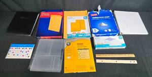 lot 57 image: Assorted Office Supplies Lot Including Paper, Envelopes, Rulers, and Binder - contents unverified