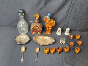 lot 69 image: Vintage Collectibles Lot with Glass Decanter, Wild Cat Juice Jug, Ceramic Pony, Miniature Mugs, Spoons, and Kennedy Shakers