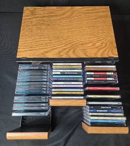 lot 103 image: Collection of 48 Assorted Jazz and Blues CDs with Oak CD Holder