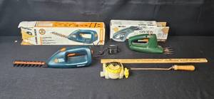 lot 117 image: Set of 2 Black & Decker Cordless Grass Shears with Timer and Garden Tool